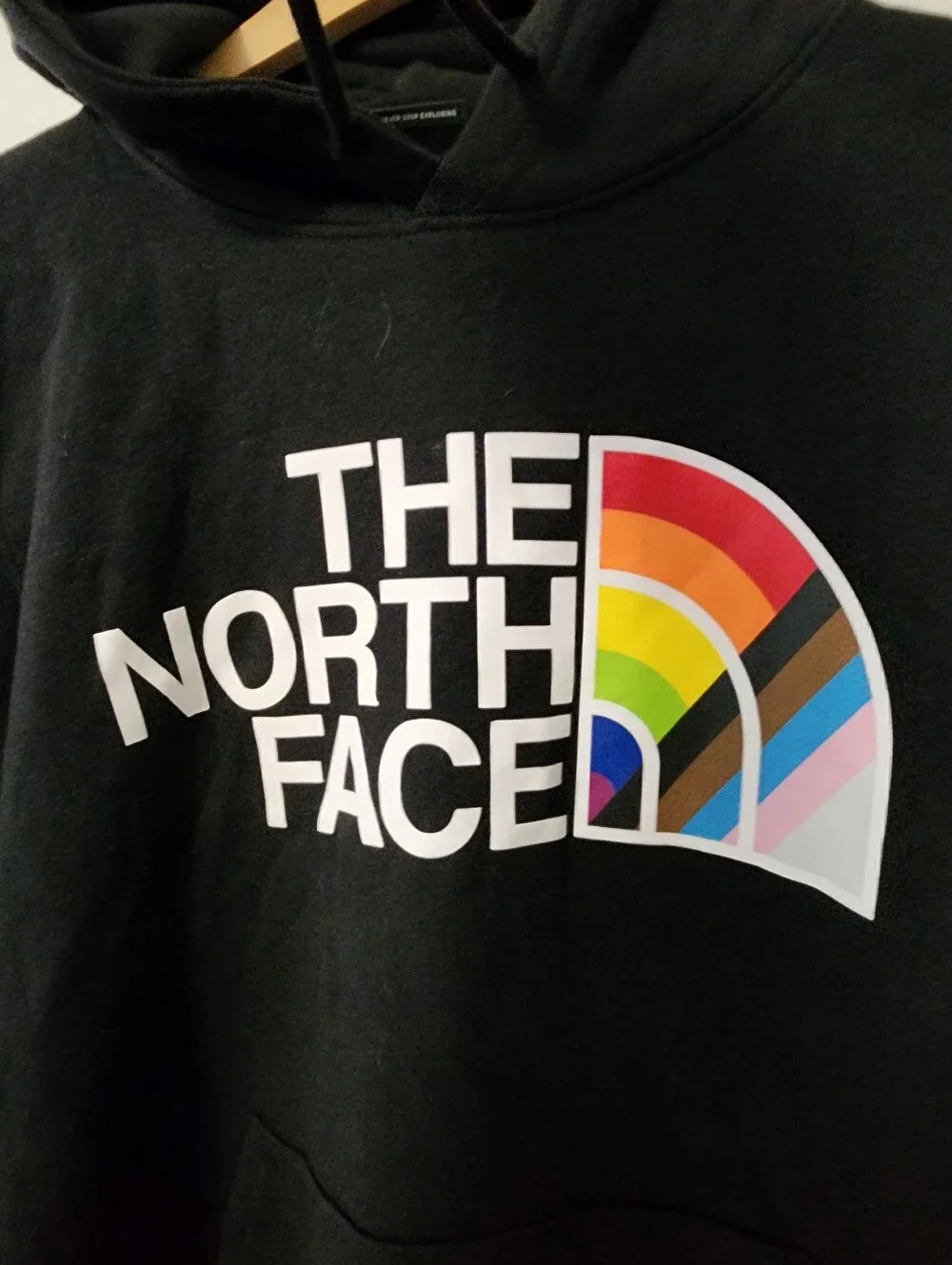 The North Face  Black Hoodie with Short Rainbow Logo